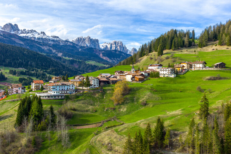 Italy, Dolomites, the Moena village and in the background the Catinaccio mountain